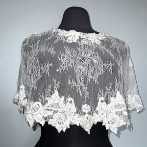 Lace capelet wedding cover